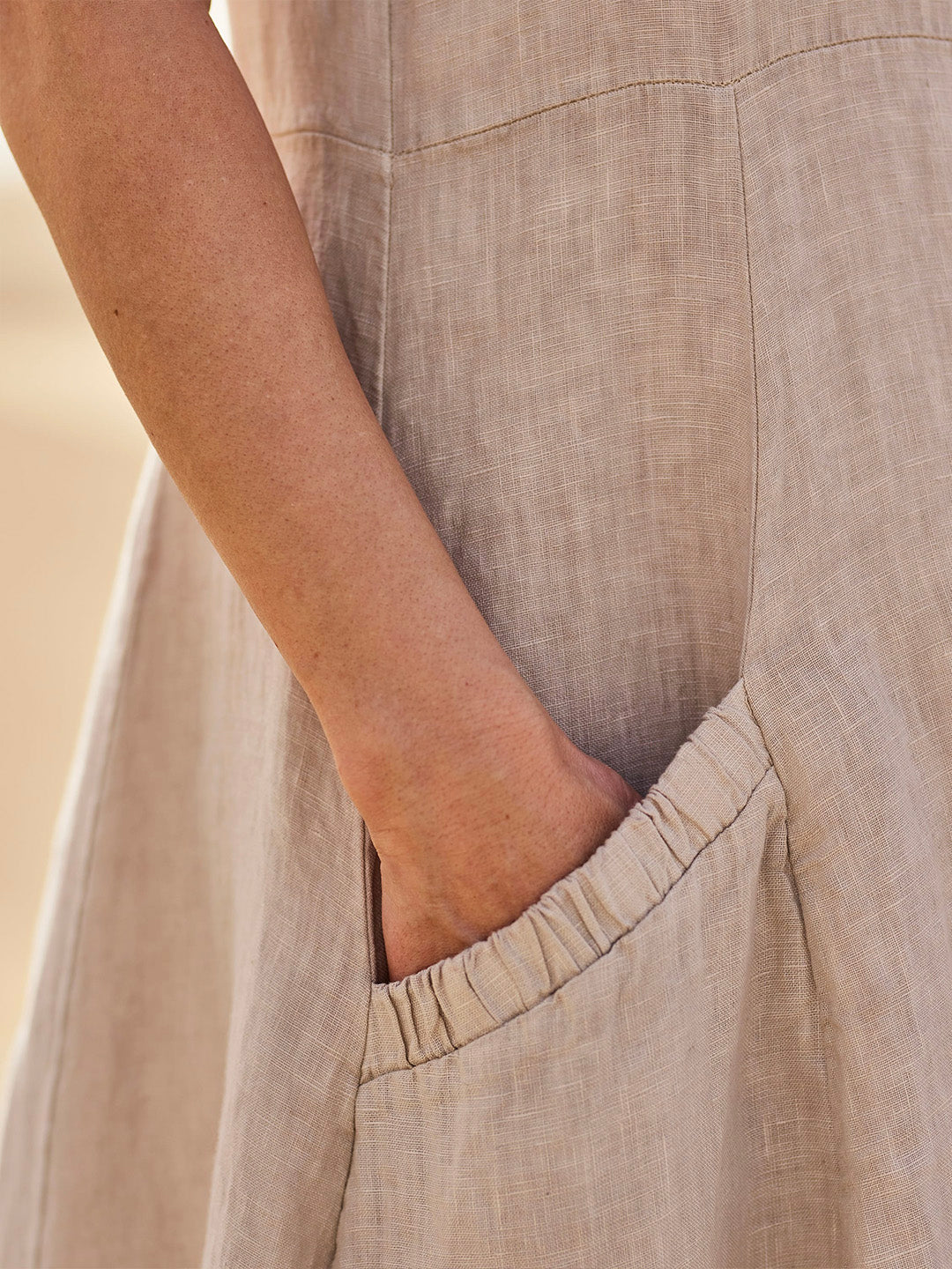 Sleeveless Midi Dress with Side Pockets and A-Line Fit