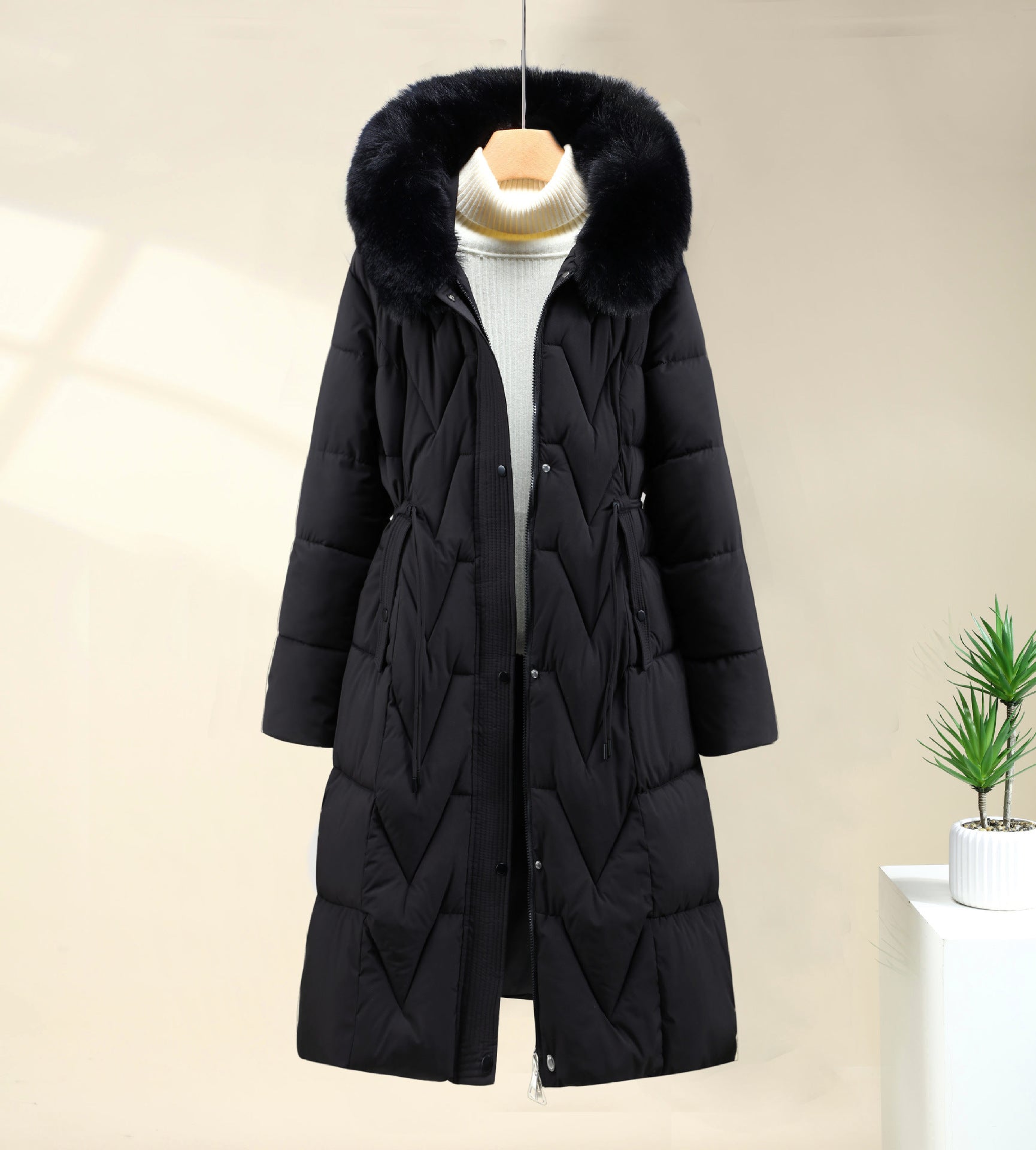 Doudoune longue à capuche pour femme avec bordure en fausse fourrure