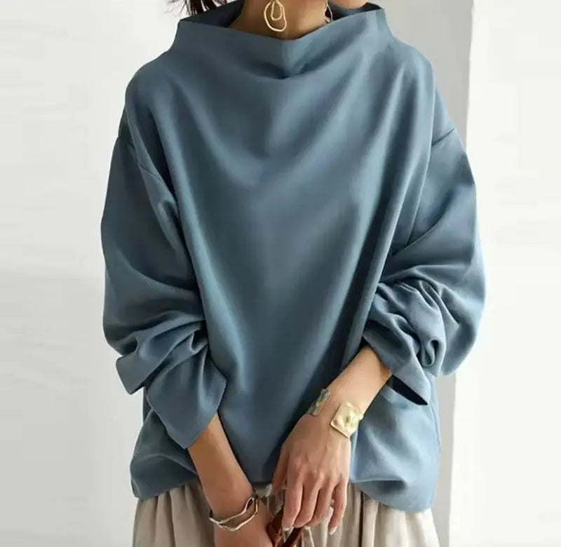 Damski oversize'owy dzianinowy top z golfem