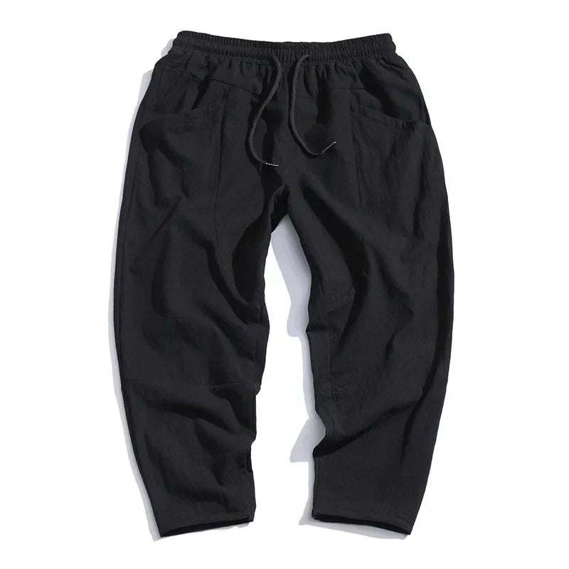 Tapered Drawstring Trousers with Side Pockets