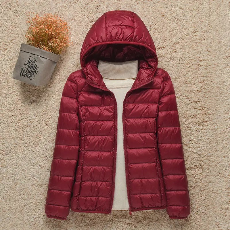 Doudoune légère et compacte à capuche pour femme