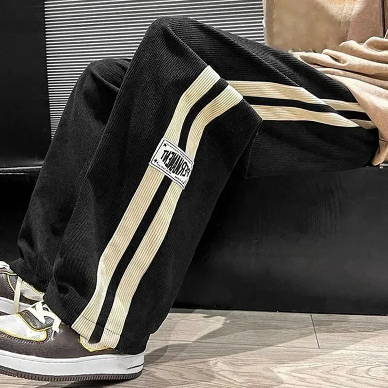 Jogging à jambes larges et bandes latérales pour homme