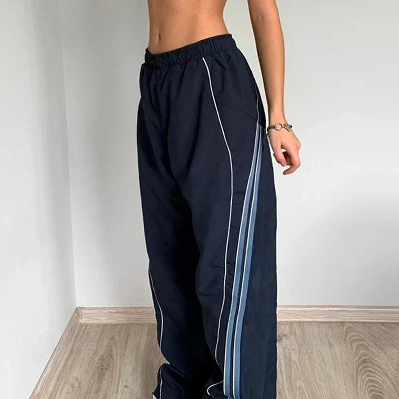 Jogger parachute pour femme à rayures latérales