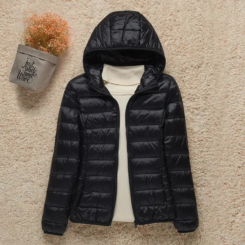 Doudoune légère et compacte à capuche pour femme