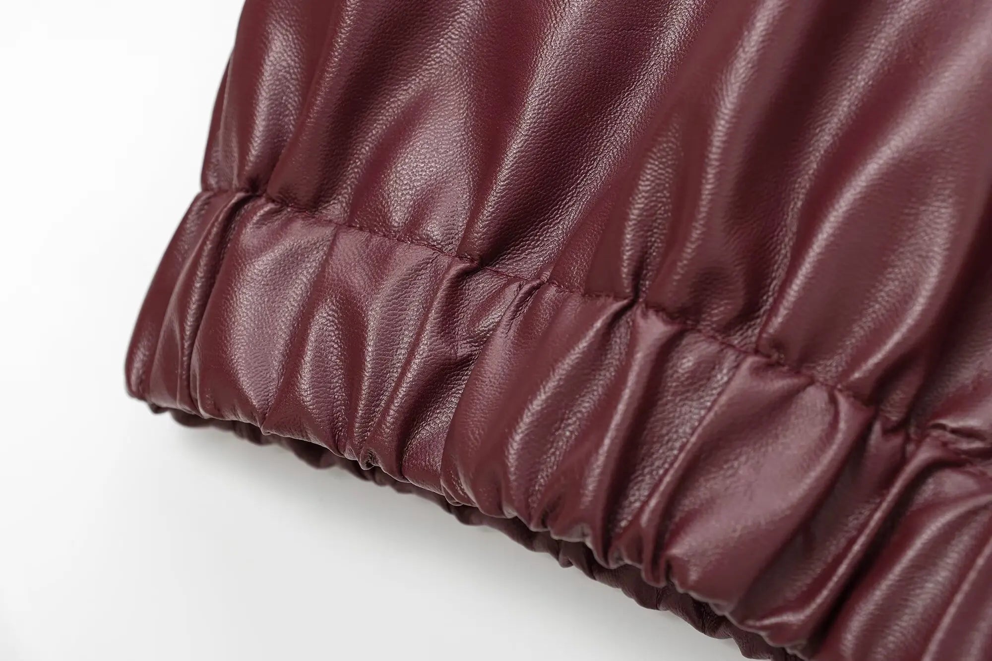 Veste courte zippée pour femme à effet cuir